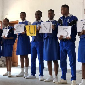 picture of Dority students with ABSUMSA placards